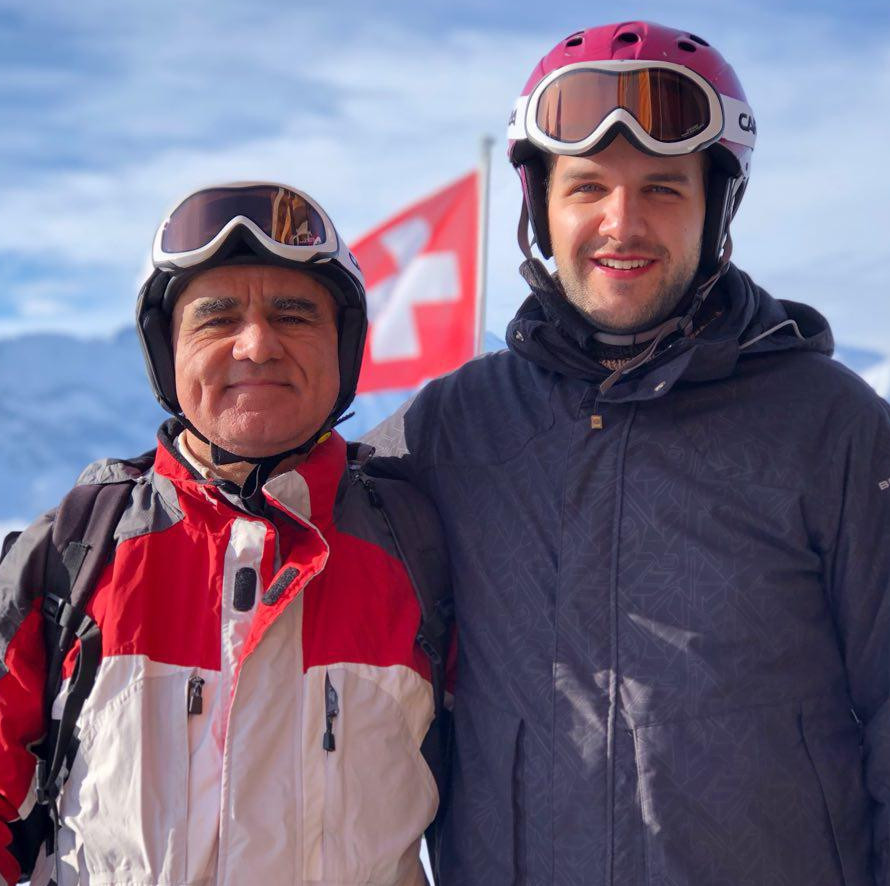 Reza and Merlin in Wengen, Switzerland, enjoying the snowy alps